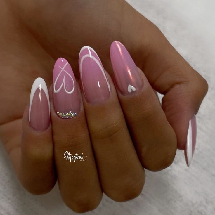 Elegant Soft Pink and White Heart Nail Design with Glitter Accents