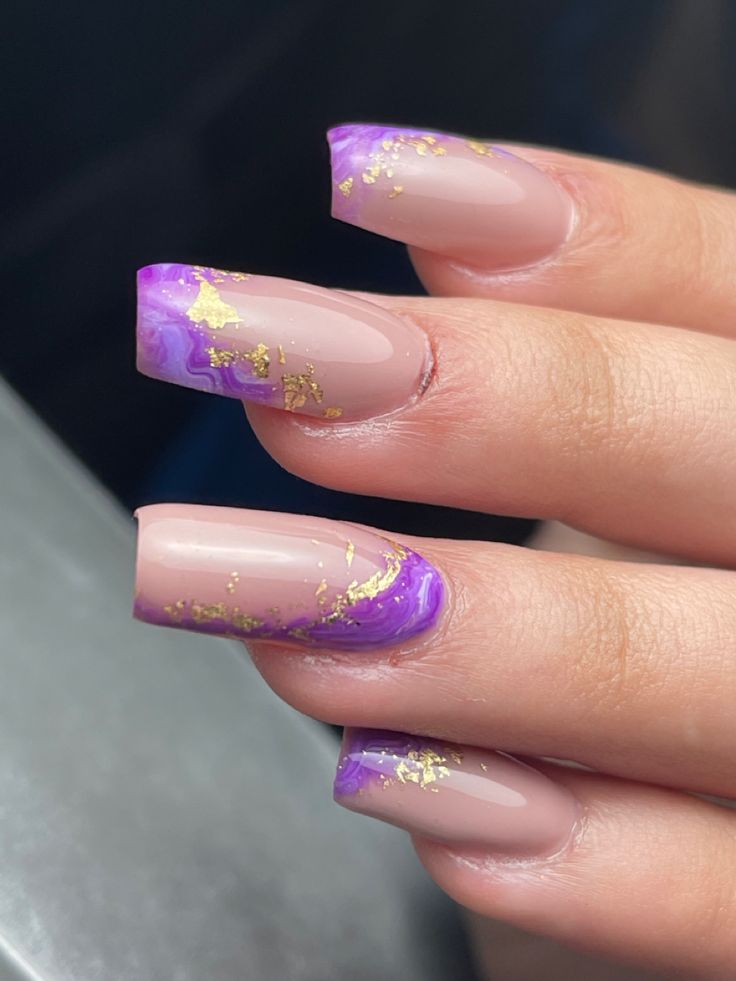 Elegant Marbled Nail Design: Soft Nude Meets Vibrant Purple with Gold Foil Accents