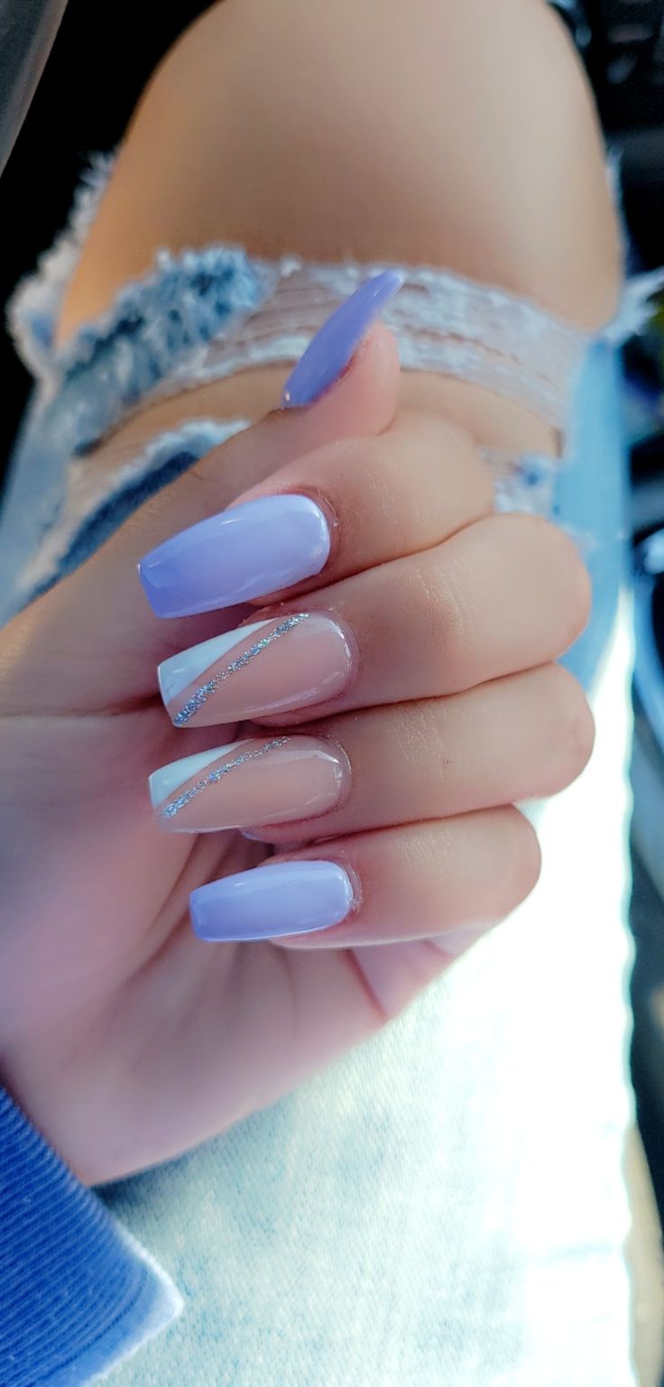 Trendy Chic Nail Design: Soft Lavender with Glossy, Matte, and Sparkling Silver Accents.