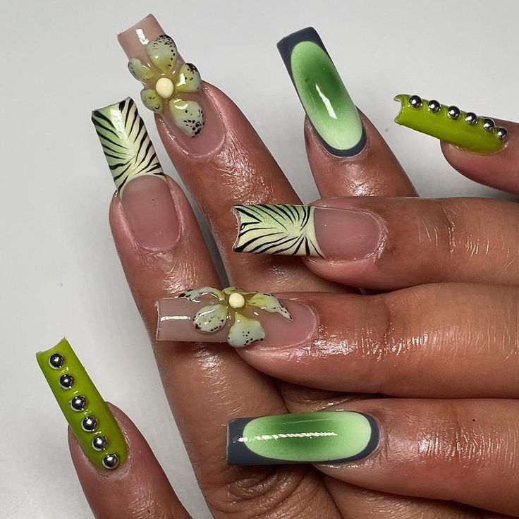 Tropical-Inspired Nail Design: Vibrant Green and Nude Blend with Glossy, Matte, and Metallic Finishes.