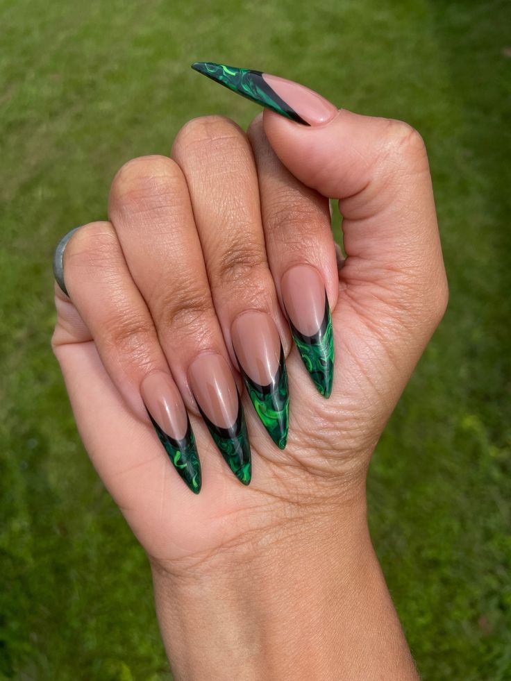 Elegant Gradient Emerald Stiletto Nails with Almond Shape and Marbled Design.