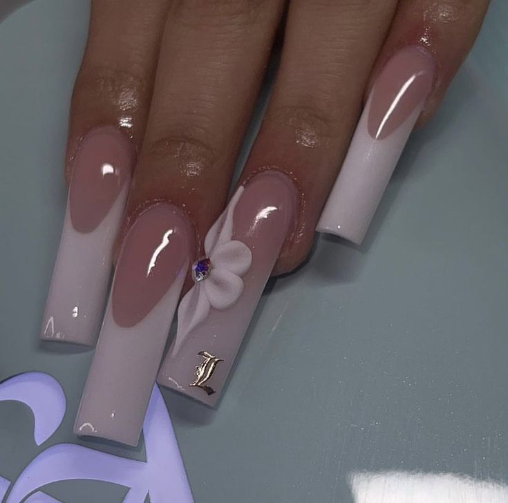 Chic Long Pink and White Nails with Floral Accents and Metallic Details for Every Occasion.