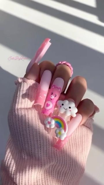 Playful Pastel Nail Design with Clouds, Rainbows, and Bears.