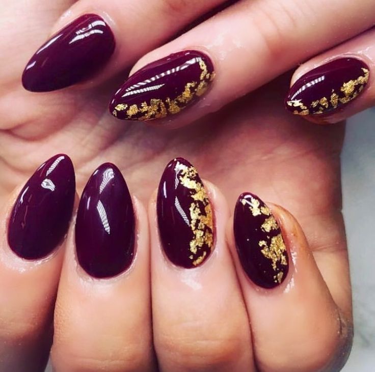 Striking Elegance: Burgundy Nails with Opulent Gold Accents