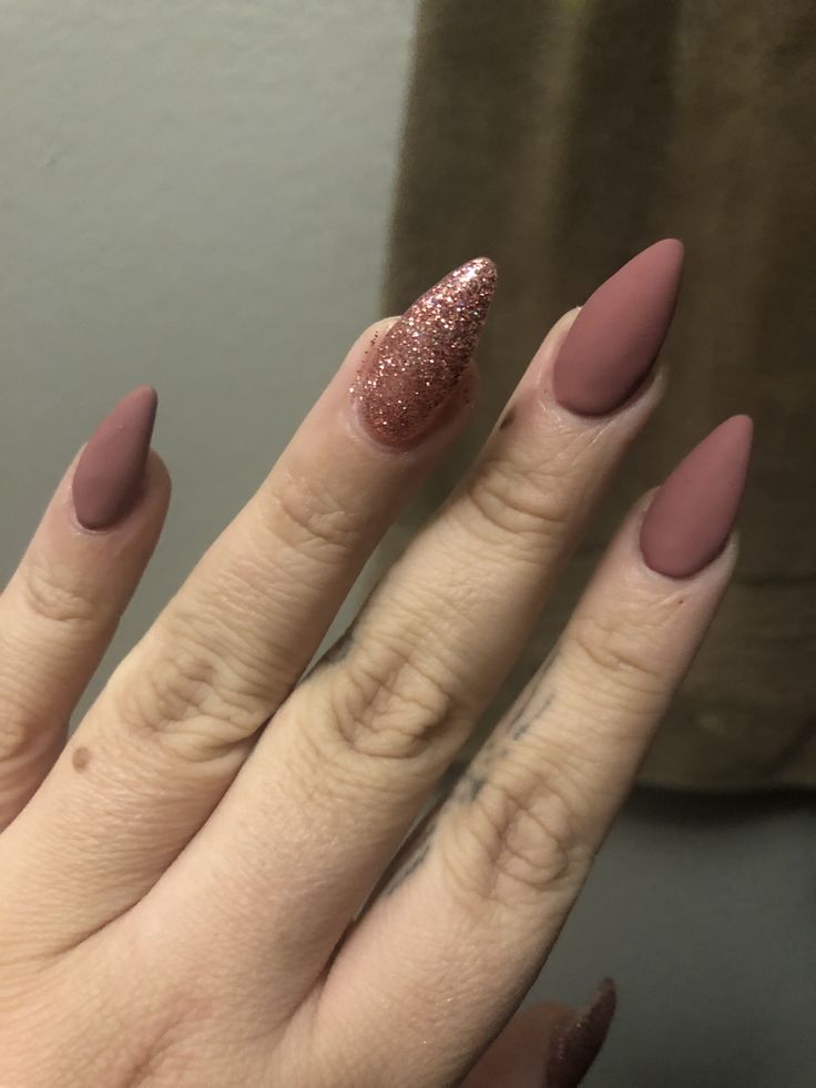 Chic Elongated Nail Design: Soft Nude Matte with Glitter Accent