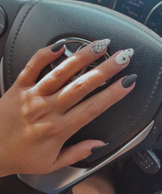 Trendy Matte Black and White Geometric Nail Design for Elegant Statement.