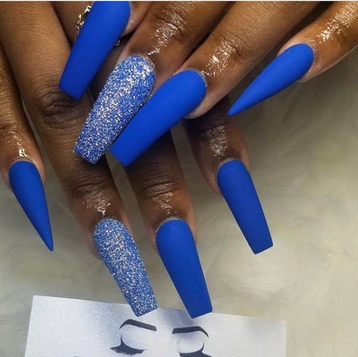 Elegant Bold Statement: Vibrant Blue Nails with Matte and Glitter Textures.