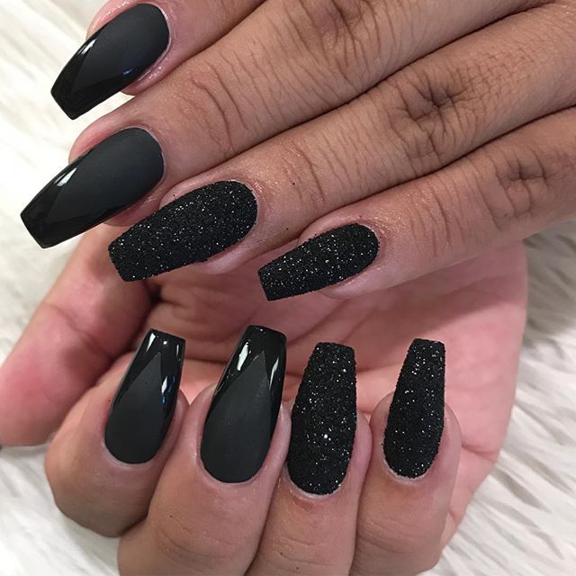 Chic Black Nail Design: A Bold Blend of Glossy and Textured Finishes.