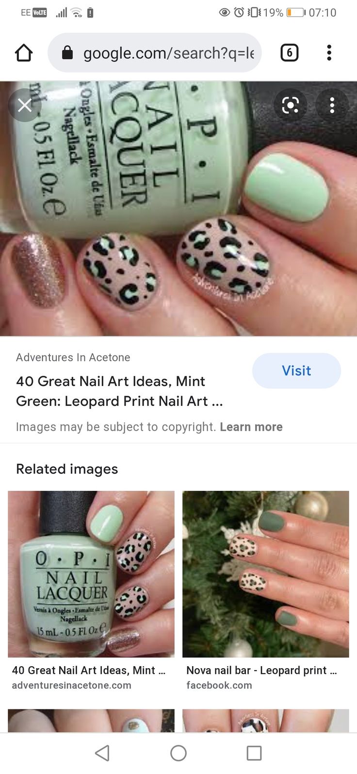 Playful Mint Green and Leopard Print Nail Art with Sparkling Accent