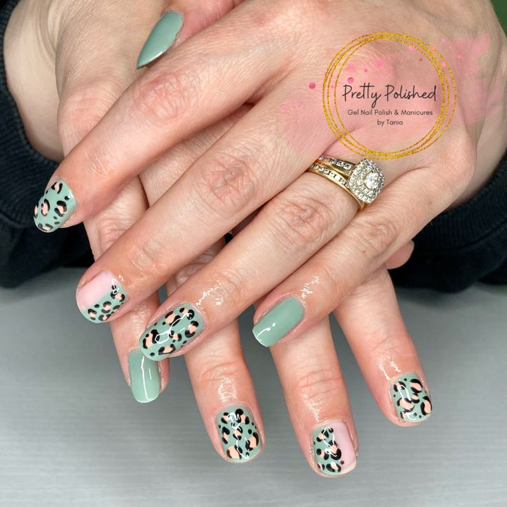 Chic Matte Mint Green and Playful Leopard Print Nail Design for Trendy Elegance.