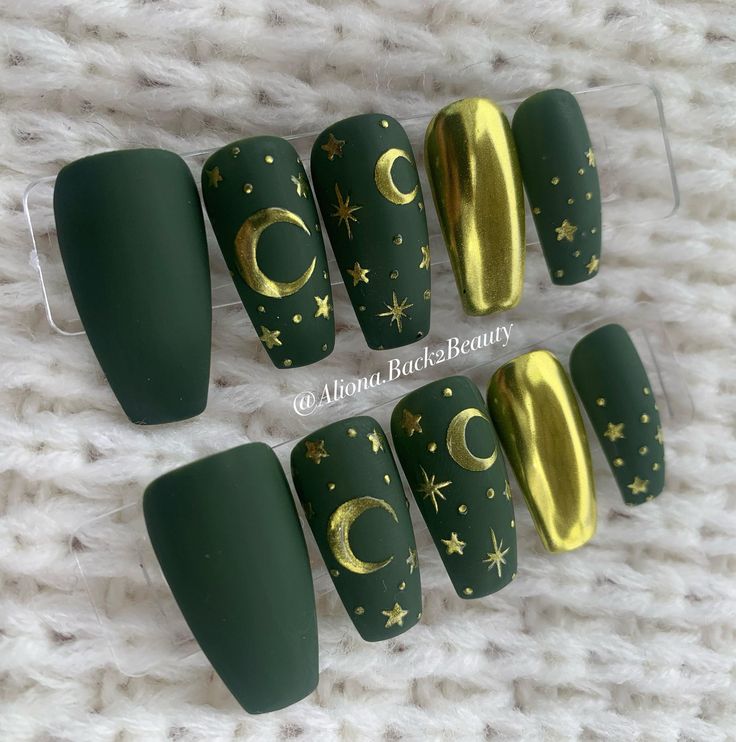 Elegant Green Nail Set with Matte Finish, Glossy Gold Accents, and Celestial Designs.