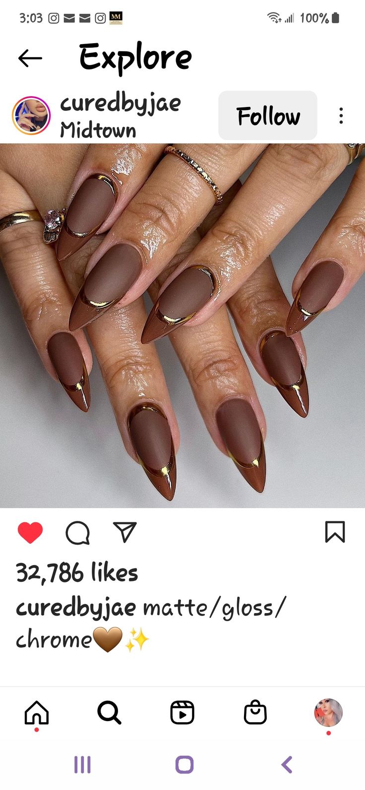 Chic Brown Matte Nail Design with Glossy Gold Tips for a Glamorous Statement.