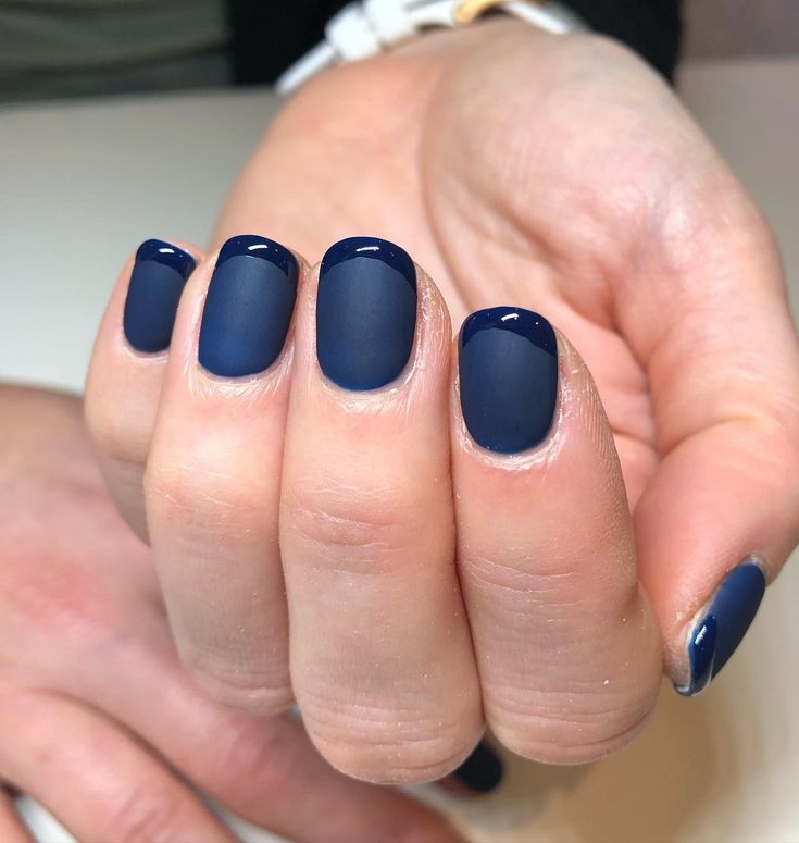 Chic Navy Blue Matte and Glossy Nail Design: A Sophisticated Blend of Elegance and Simplicity.