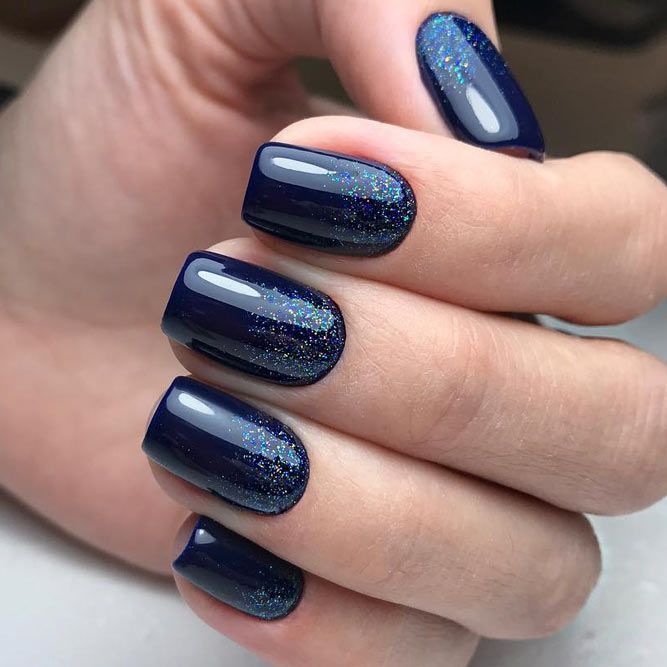 Elegant Navy Blue Nails with Glitter Accents: A Sophisticated Look for Any Occasion