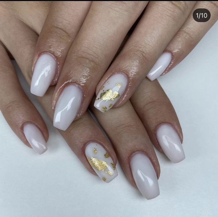 Chic and Modern Elegant Nail Design with Soft White Base and Gold Foil Accents