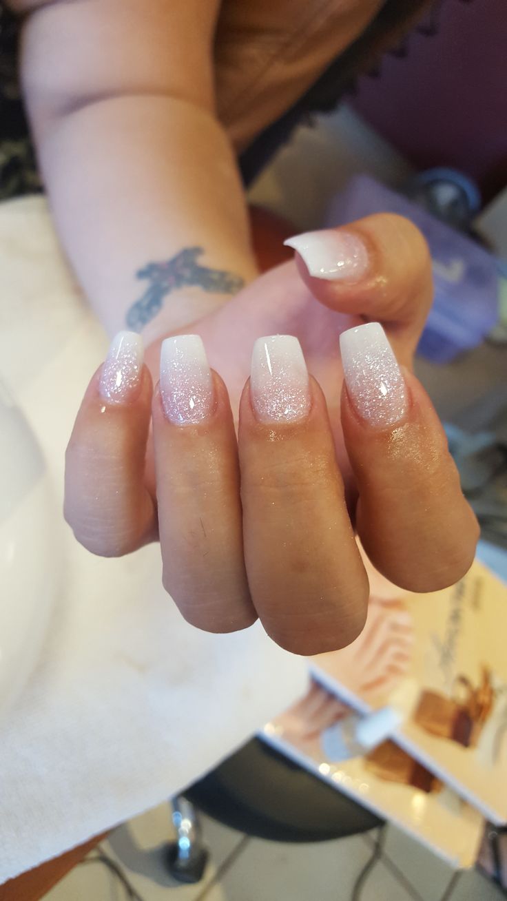 Elegant Glittery Ombre Nails with Soft Pink to Sparkling White Transition