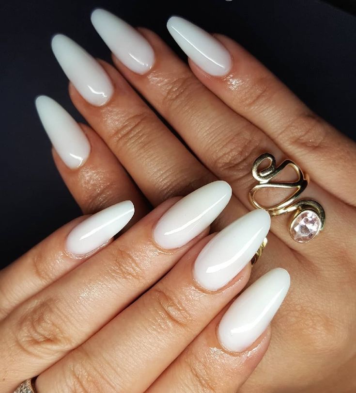 Chic Ombre Nail Design with Glossy White Finish and Elegant Almond Shape.