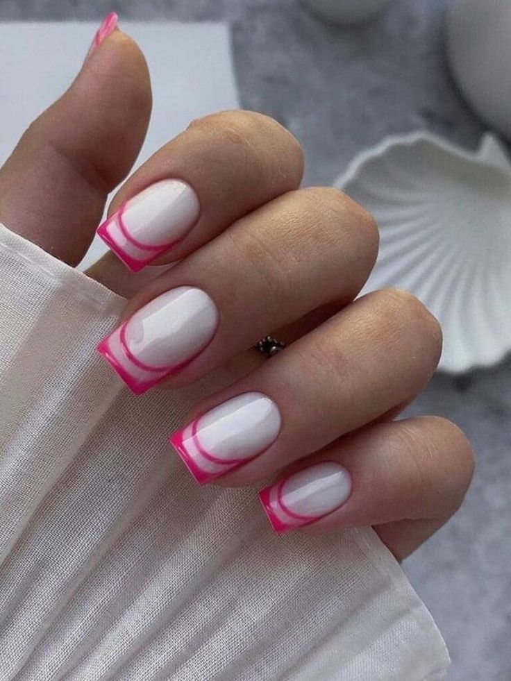 Modern White and Pink Curved Nail Design: A Bold and Sophisticated Look.