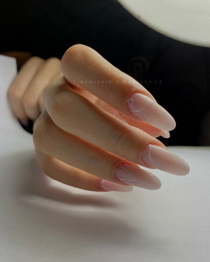 Elegant Almond-Shaped Ombre Nails with Glossy Finish for a Polished Look.