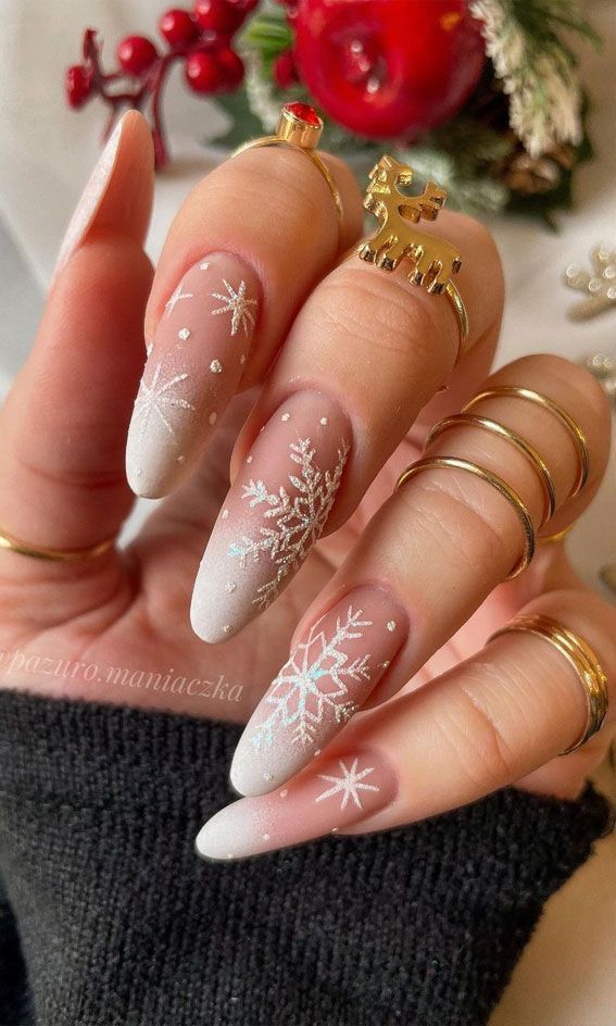 Elegant Holiday Nail Design with Pastel Gradient and Sparkling Snowflakes.