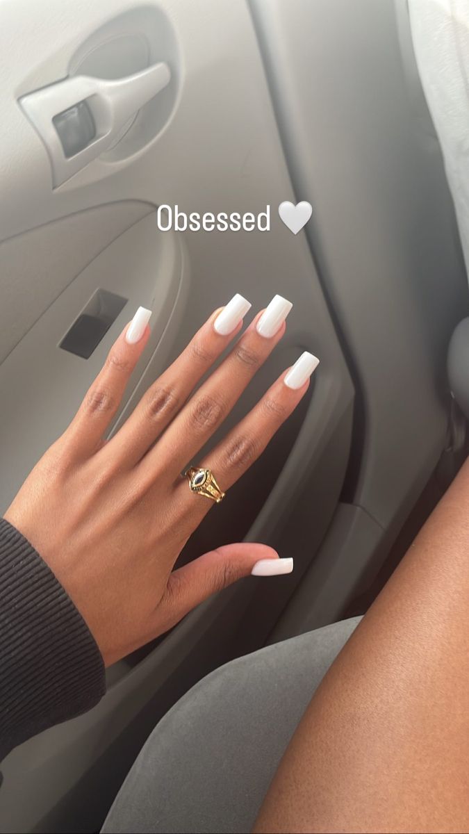 Chic Glossy White Square Nails with Delicate Gold Accent.