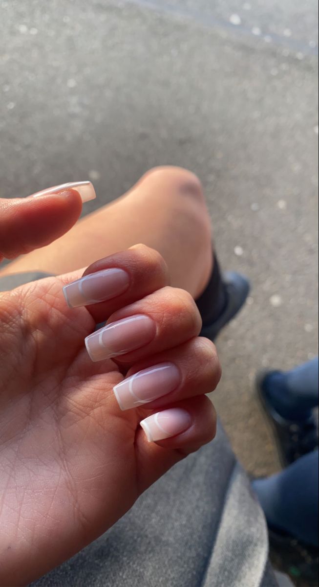 Classic French Tip Manicure: Elegant Nude and White Design for Any Occasion