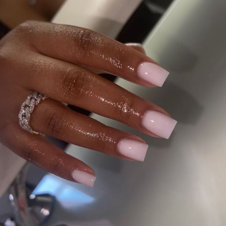 Sophisticated Soft Pink Glossy Nail Design with Square Shape for Versatile Elegance.