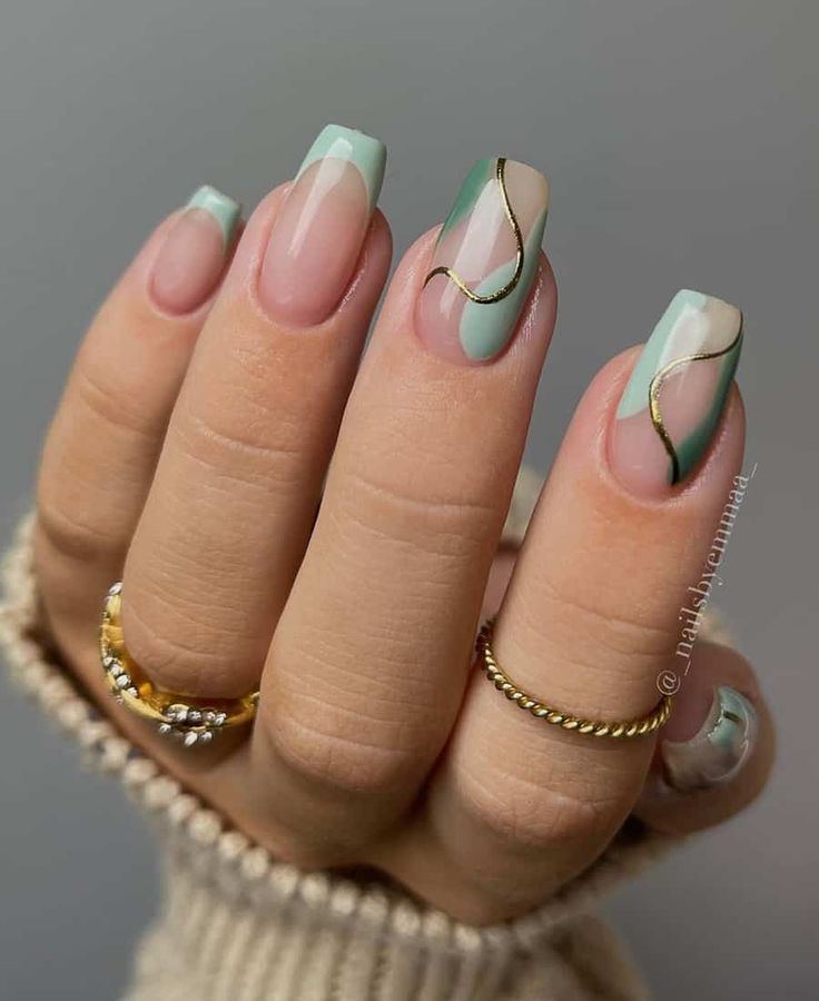 Chic Mint Green and Soft Nude Geometric Nail Design with Gold Accents.