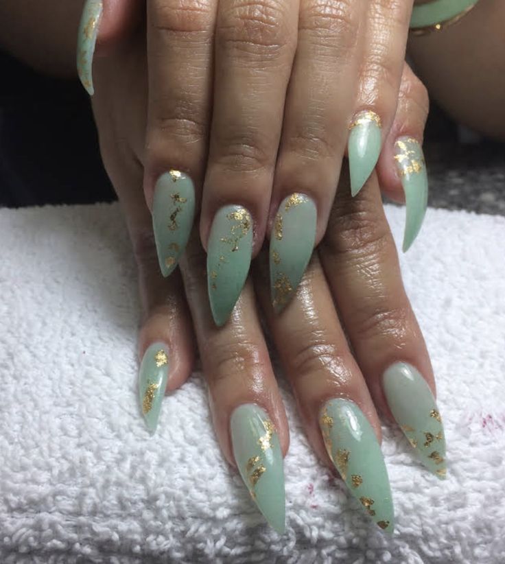 Elegant Mint Green Almond Nails with Glossy Finish and Gold Foil Accents