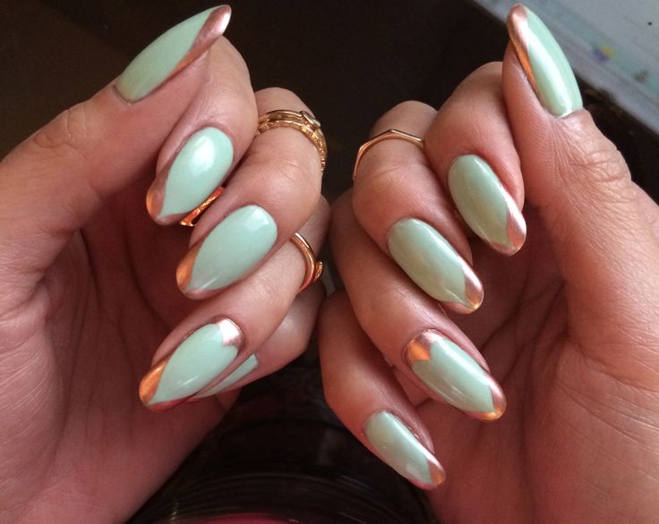 Elegant Mint Green Nails with Metallic Rose Gold Tips for a Chic Look.