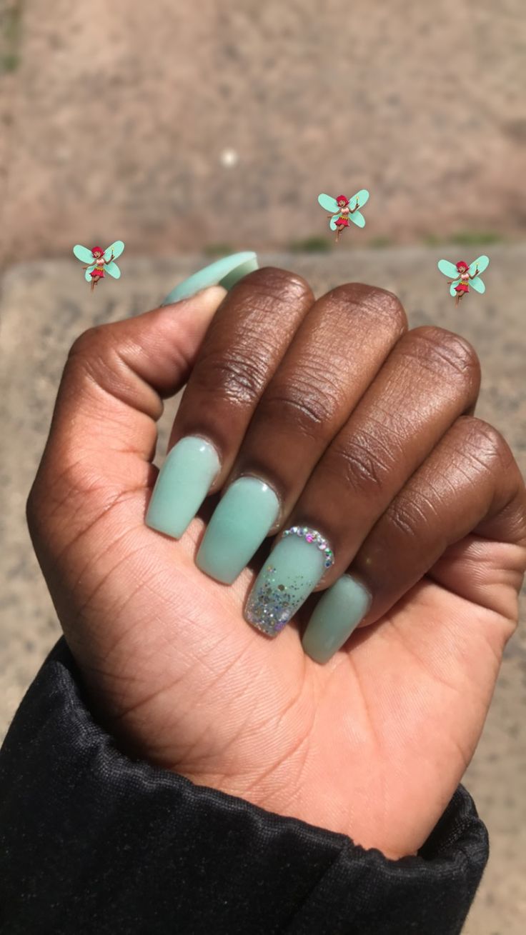 Stylish Mint Green Nail Design with Matte and Glitter Finishes for a Fun Look