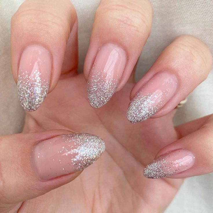 Elegant Ombre Nail Design: Soft Nude Base with Glittering Silver Tips for Any Occasion