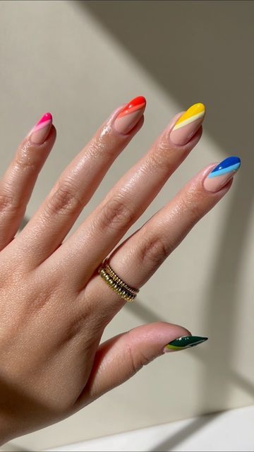 Vibrant Geometric Nail Design: A Playful and Modern Twist on Bold Nail Art.