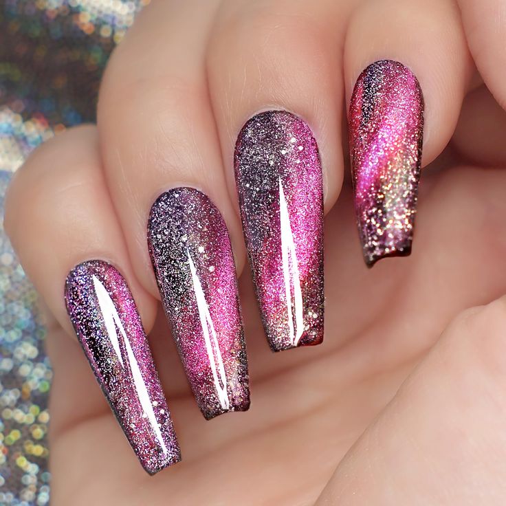 Glamorous Ombre Nail Design with Pink and Purple Hues and Glitter Finish