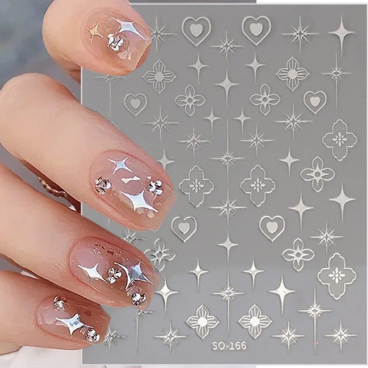 Elegant Nude Nail Design with Silver Star and Heart Embellishments