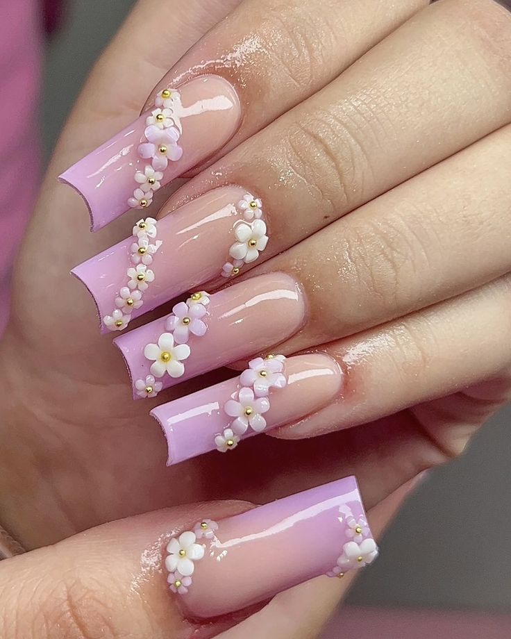 Whimsical Pink Floral Nail Design with Golden Beads for Elegant Spring Style.