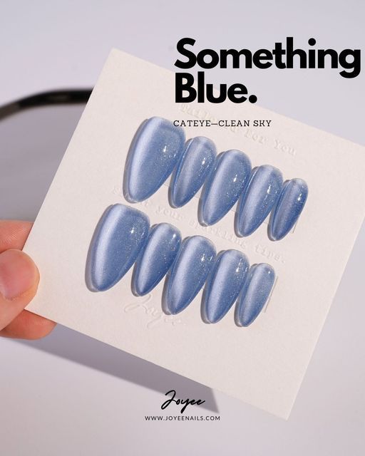 Serene Blue Nail Designs with Mesmerizing Cat-Eye Elegance