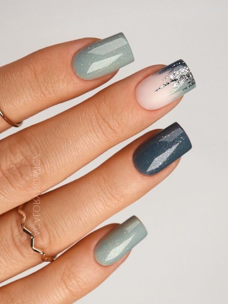 Chic Geometric Nail Design with Textured Finishes and Muted Color Palette.