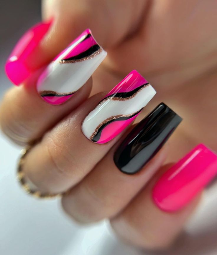 Bold and Elegant Nail Design: Striking Pink and Black with Wavy White Stripes and Gold Accents