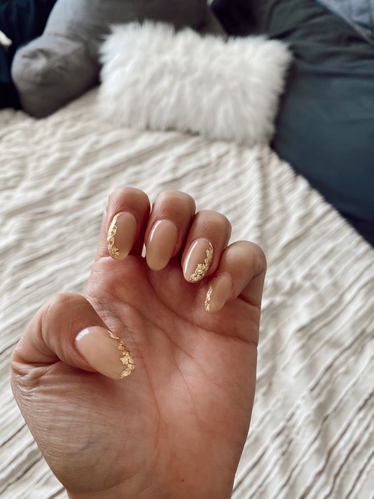 Chic Elegant Nude Nails with Gold Foil Accents for Effortless Sophistication.