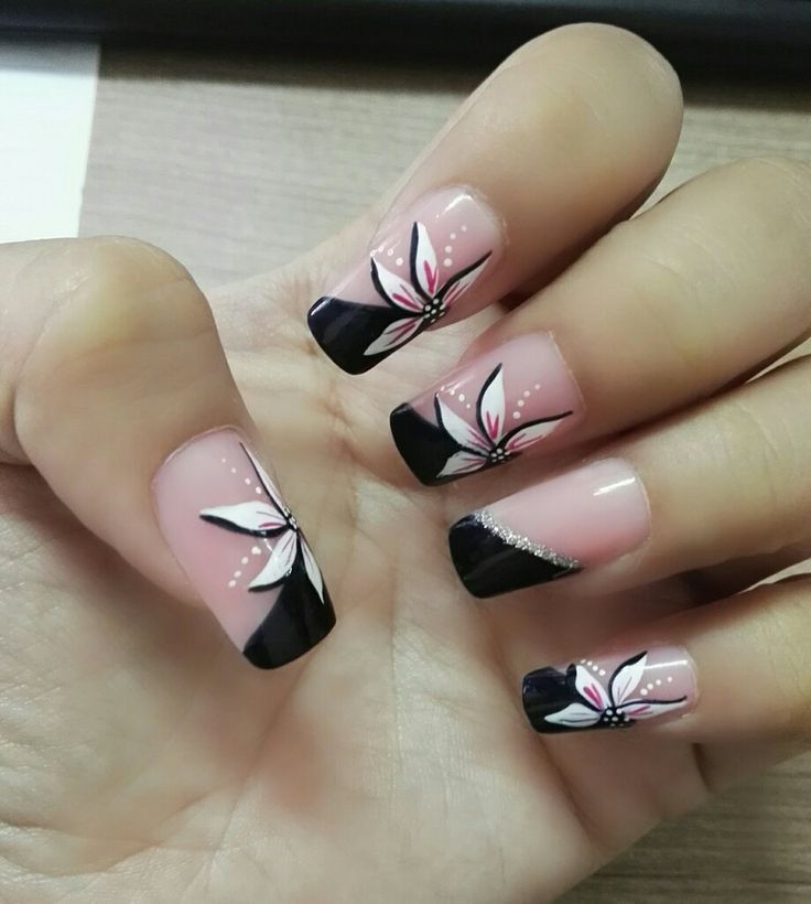 Elegant Flower-Embellished Nail Design with Feminine Floral Patterns and Subtle Sparkle.