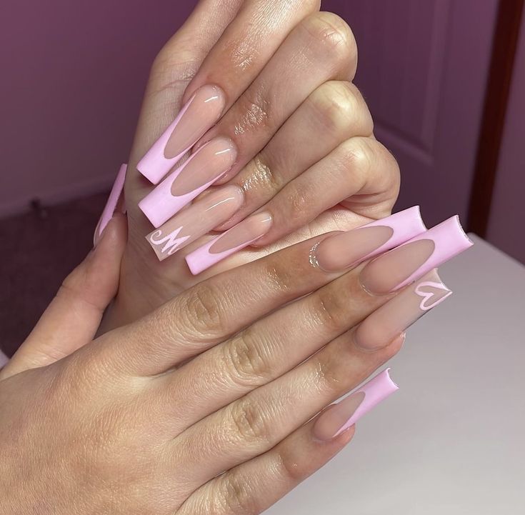 Trendy Ombre Long Pink Nails with Playful Lettering for a Modern Aesthetic