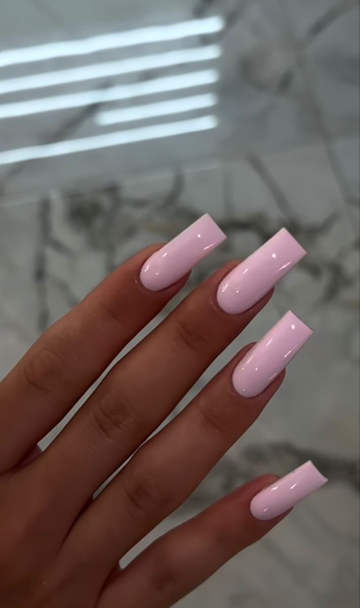 Chic Pastel Pink Long Nails for a Sophisticated Feminine Touch.