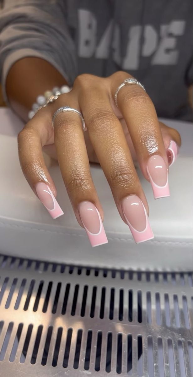 Chic Soft Pink and White Tips Nail Design for a Modern Statement