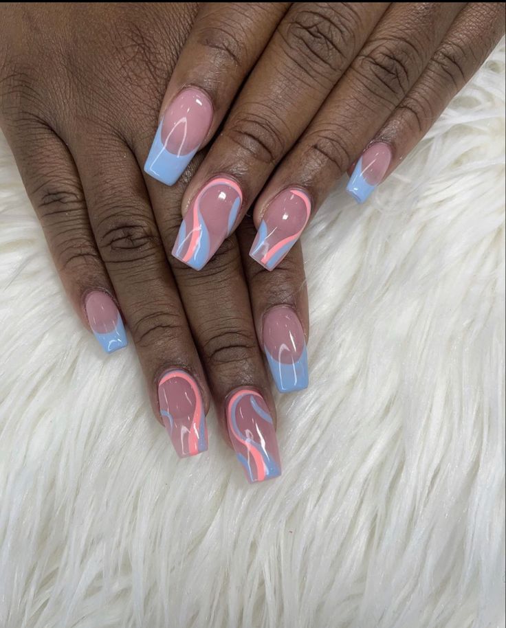 Playful Pastel Pink and Blue French Tip Nail Design: A Modern Blend of Elegance and Creativity.