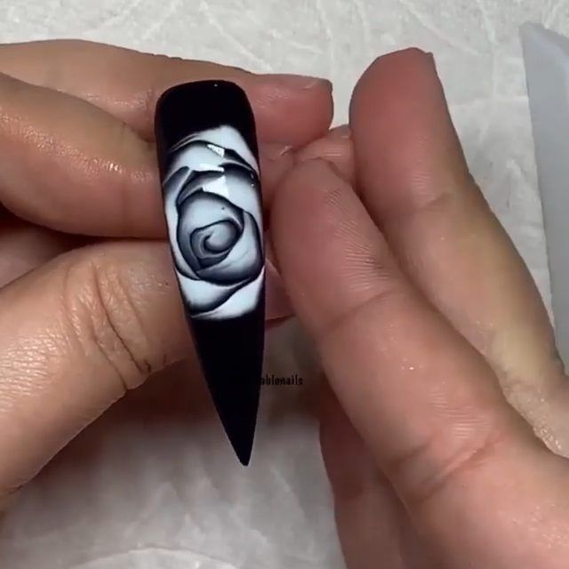 Elegant Black and White Rose Nail Design for a Sophisticated Manicure