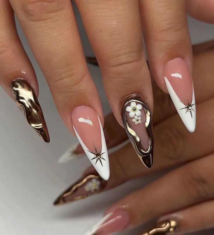 Sophisticated Stiletto Nail Design with Soft Pink, White, and Gold Accents