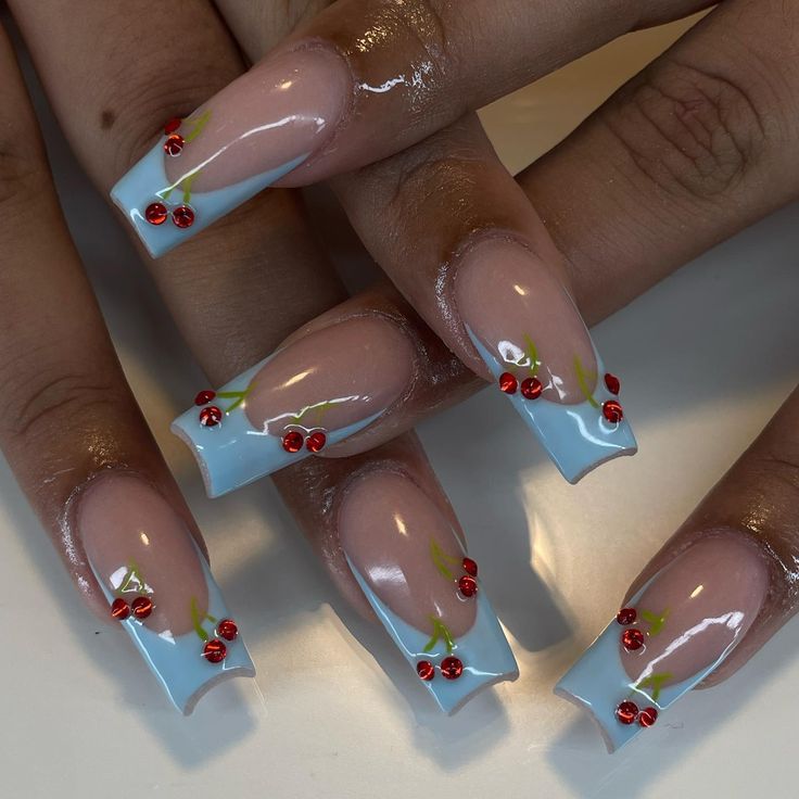 Glossy Pastel Blue Nail Design with Delicate Cherry and Leaf Accents