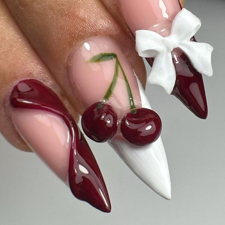 Chic Cherry-Themed Nail Art with Glossy Finish and Unique Shapes