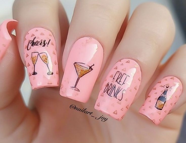 Festive Pink Nail Art with Glittery Drink Designs and Gold Accents